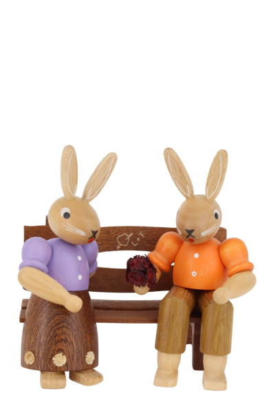 Pair of Easter bunnies sitting on a bench by Müller Kleinkunst_1