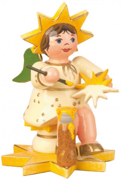 Weihnachtsfigur Sternkind Sternmaler von Hubrig Volkskunst GmbH Zschorlau/ Erzgebirge ist 5 cm groß.